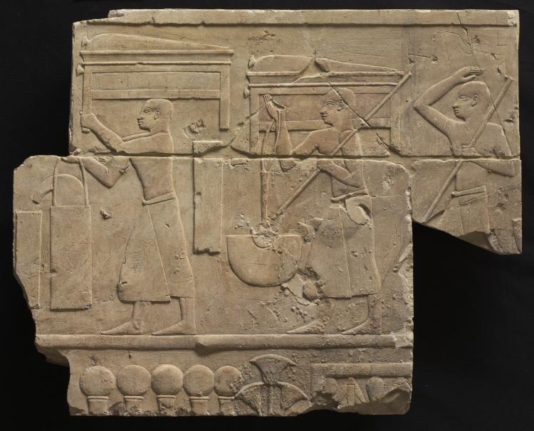 Men Bearing Tomb Equipment by Unknown Artist (-667), limestone at Cleveland Museum of Art
