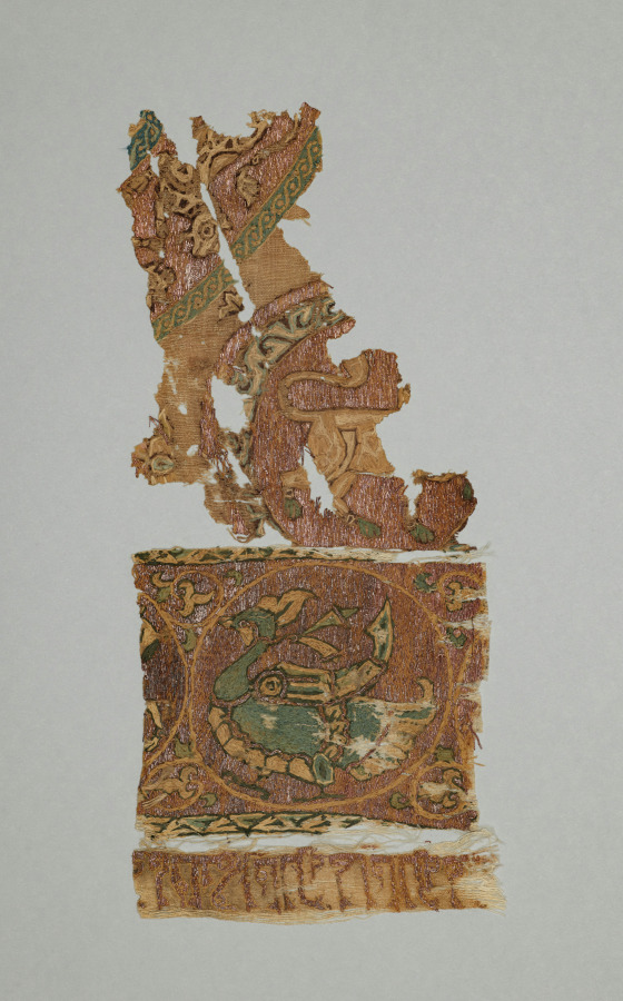 Embroidered border and field of animals in large roundels