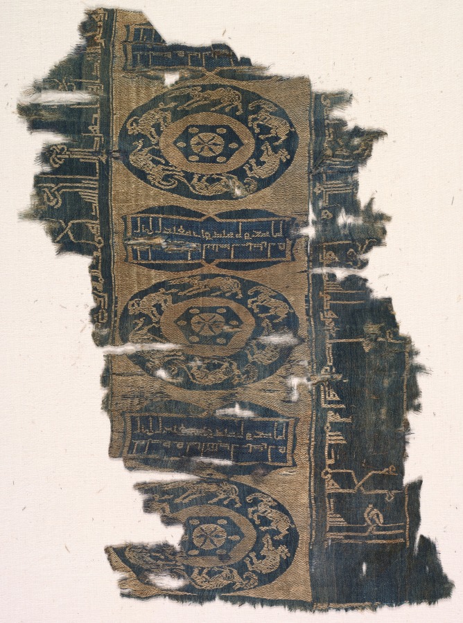 Fragment with running animal roundels and kufic inscriptions