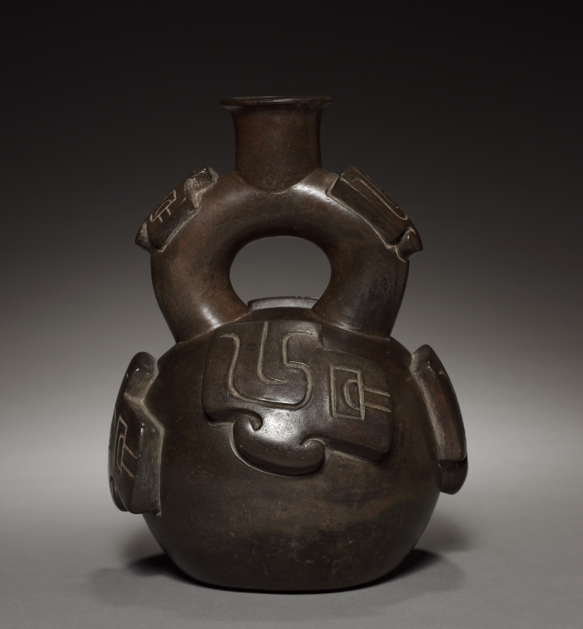 Vessel with Stirrup Spout
