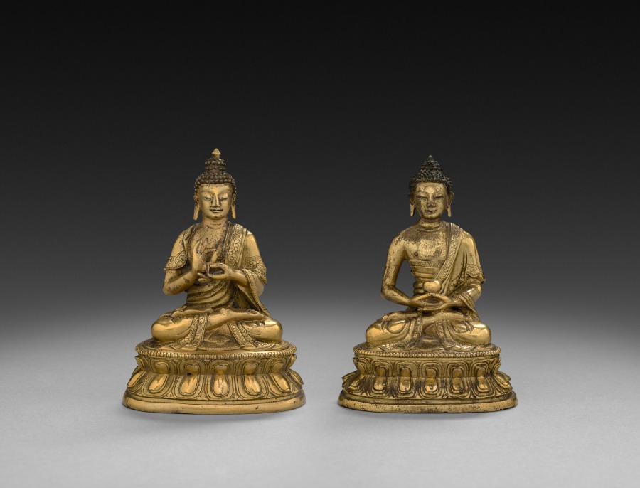 Pair of Seated Buddhas by Unknown Artist (1500), gilt bronze at Cleveland Museum of Art