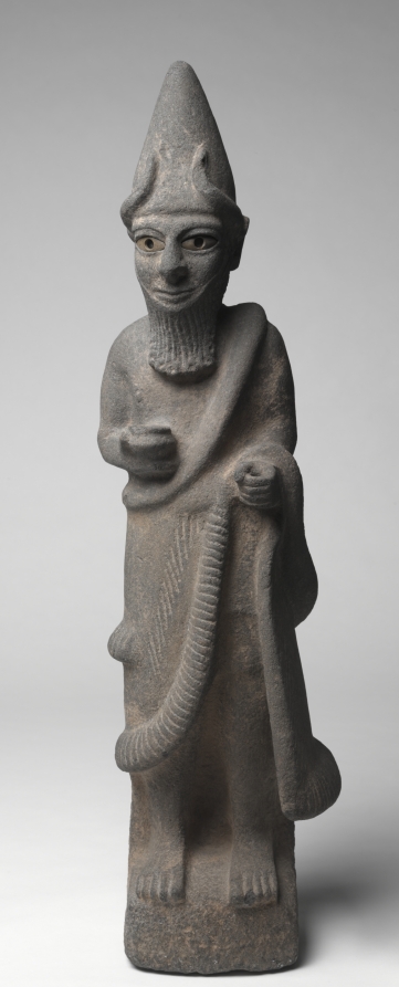Priest-King or Deity by Unknown Artist (-1605), basalt with bone eyes (left, ancient; right, restored) at Cleveland Museum of Art