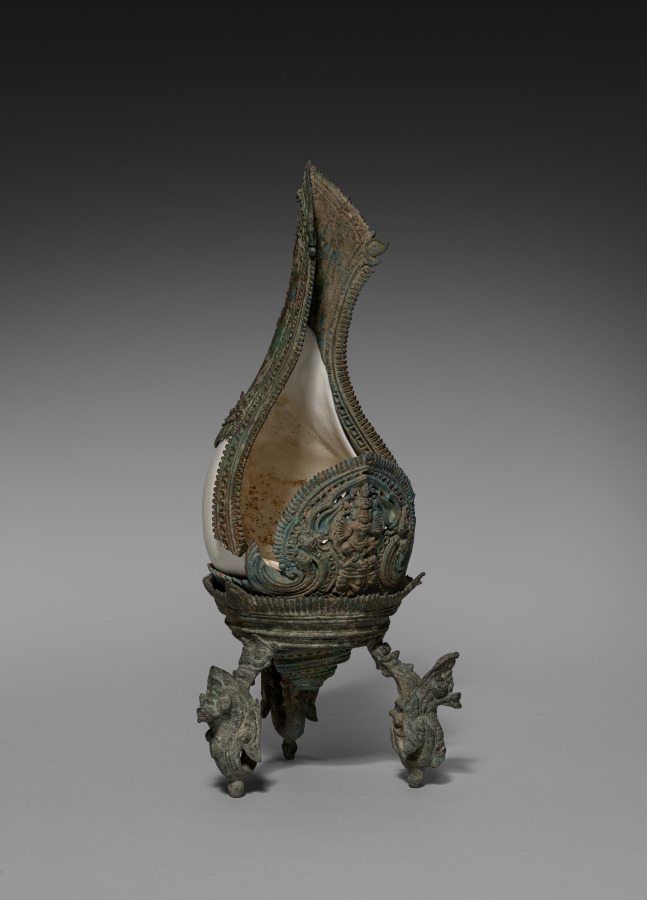 Conch Shell with a Figure of Hevajra by Unknown Artist (1100), shell and bronze at Cleveland Museum of Art