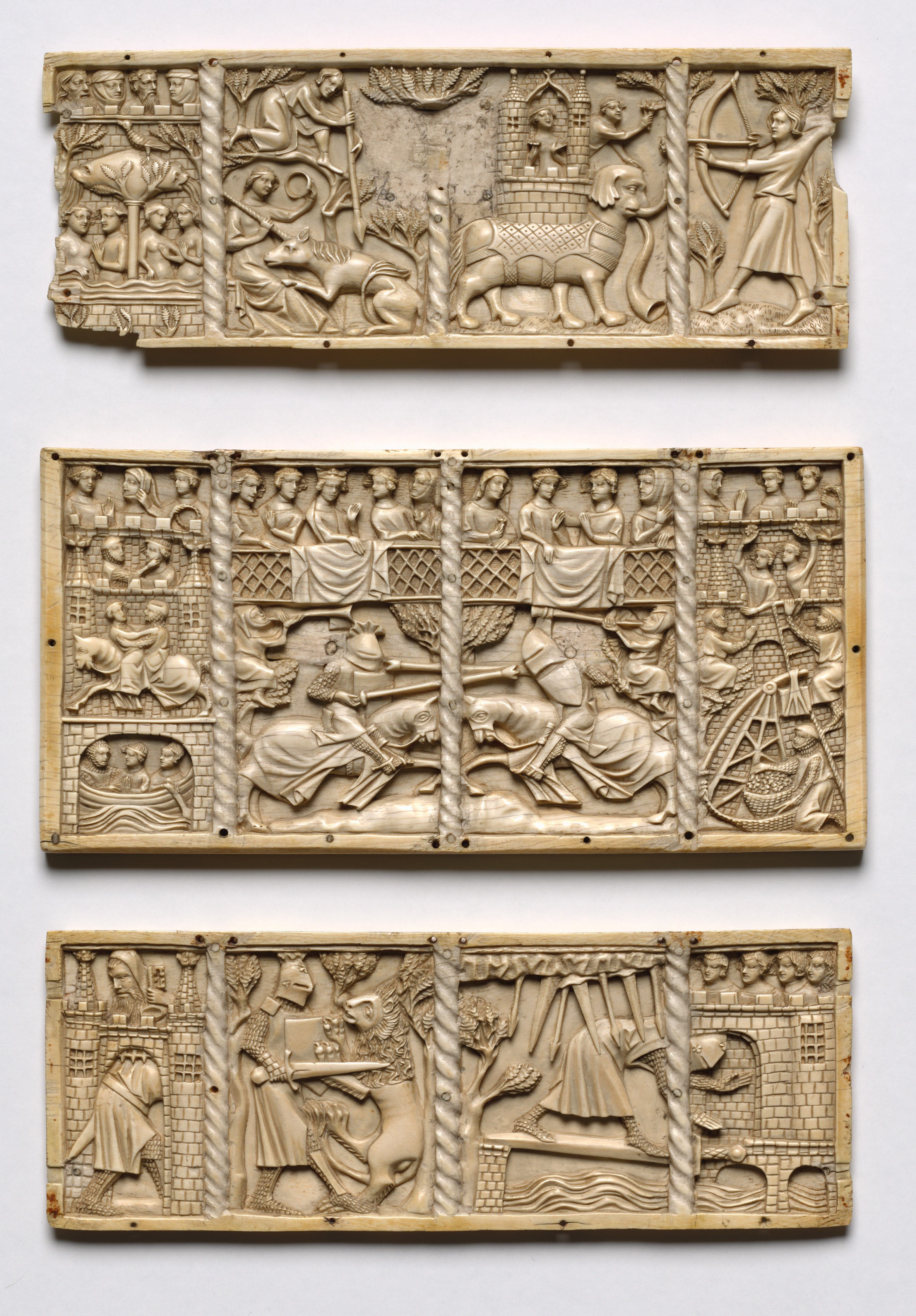 Set of Three Panels from a Casket with Scenes from Courtly