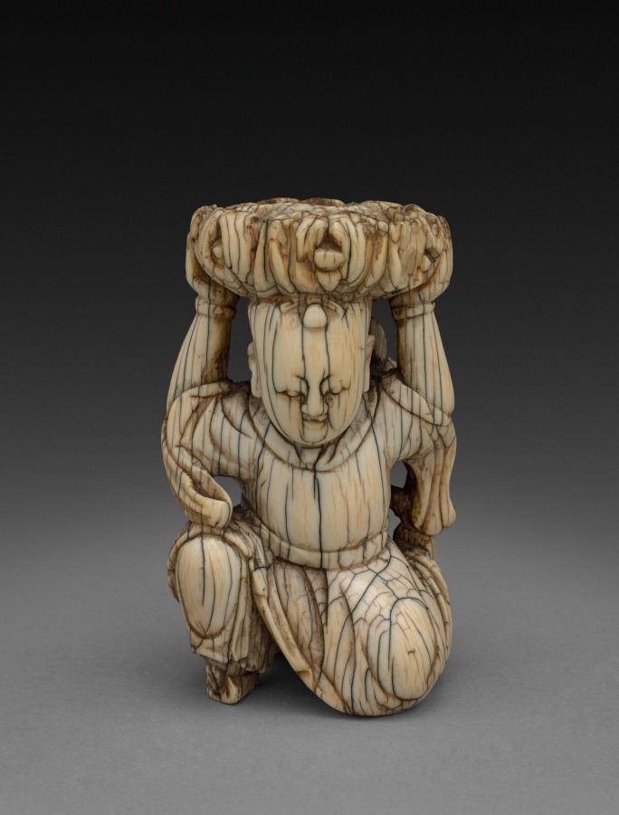 Kneeling Woman by Unknown Artist (-100), painted earthenware at Cleveland Museum of Art