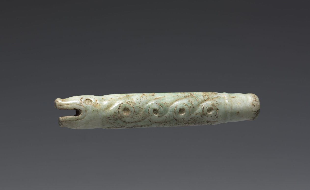 Serpent-form Fan Handle(?) by Unknown Artist (900), pale green jade at Cleveland Museum of Art