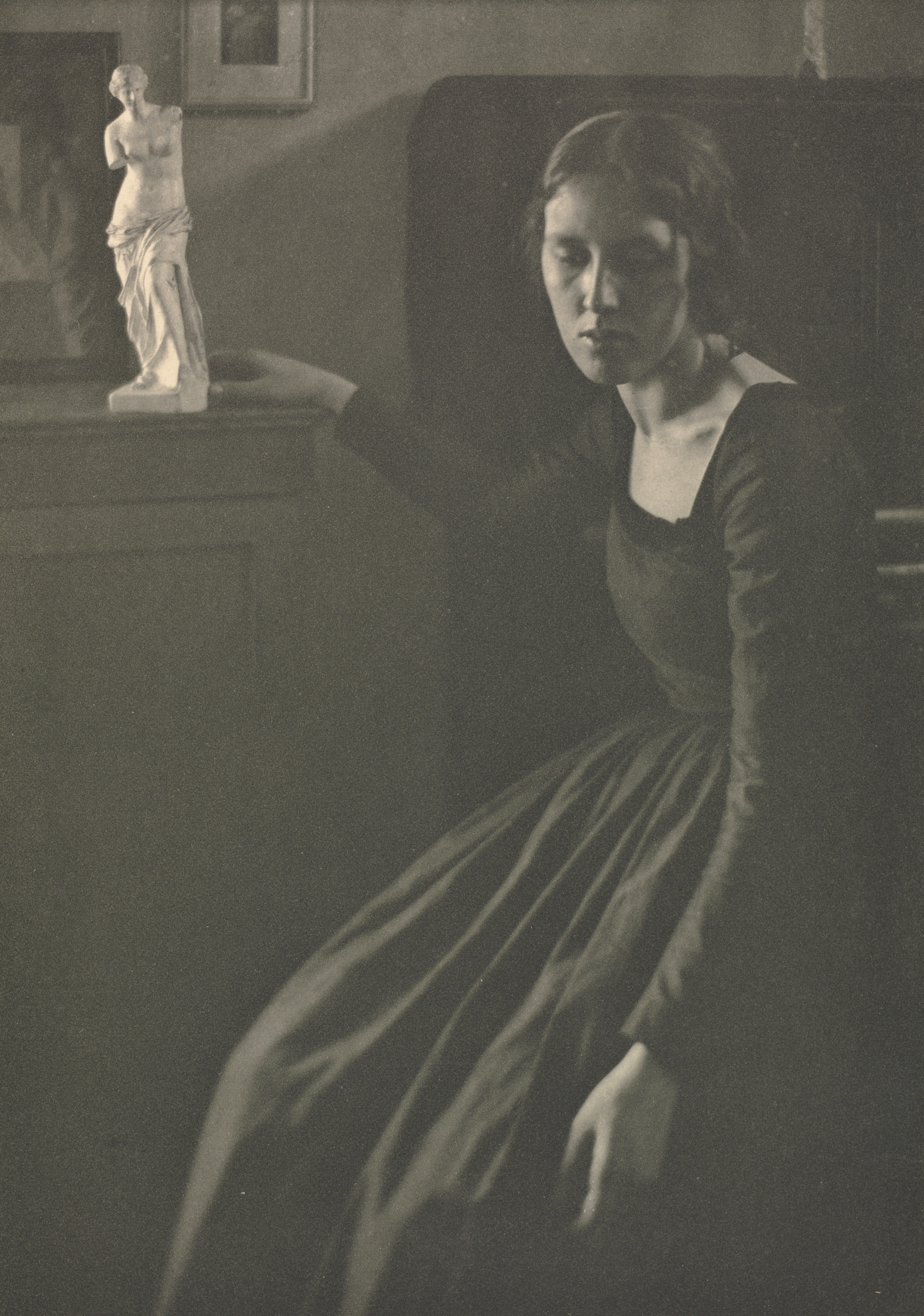 Camera Work: Lady in Black with Statuette