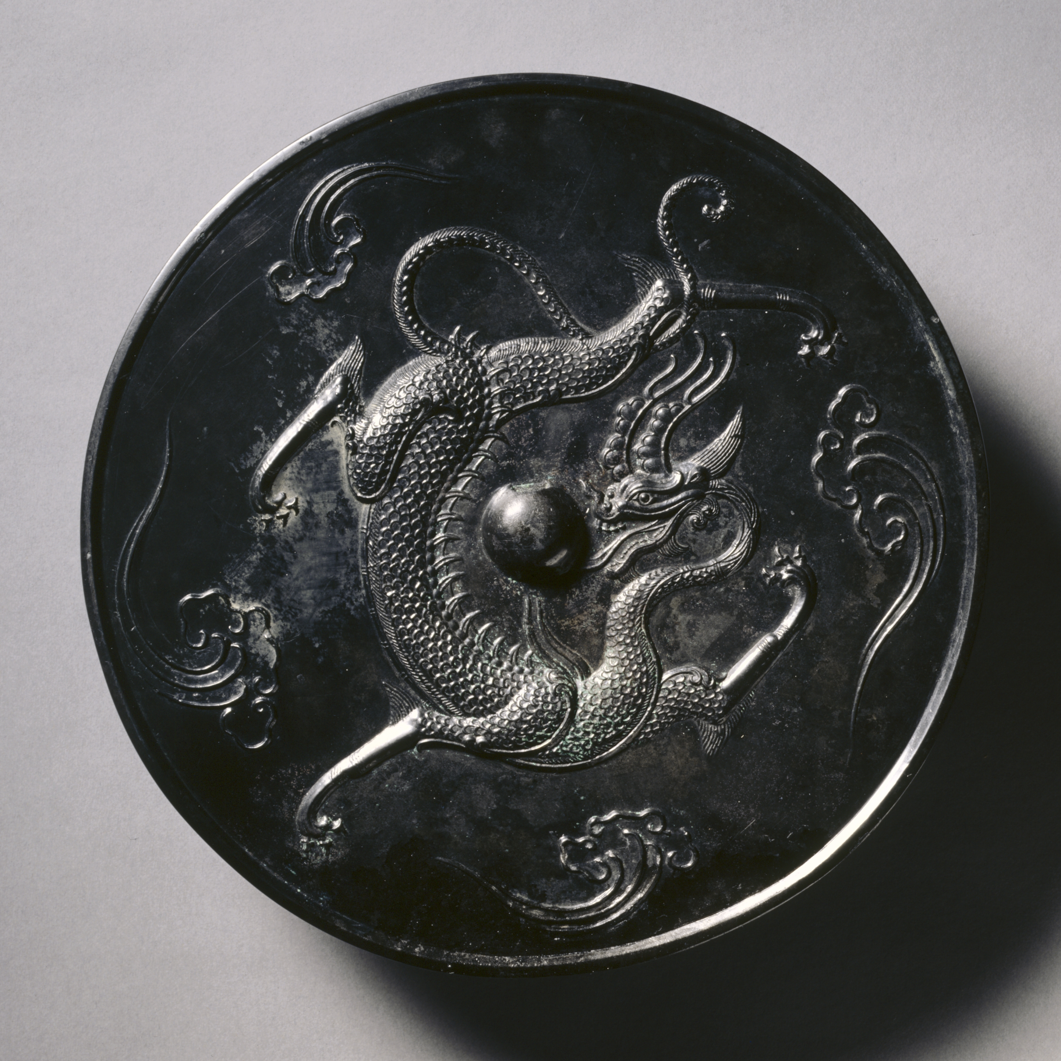 Mirror with a Coiling Dragon | Cleveland Museum of Art