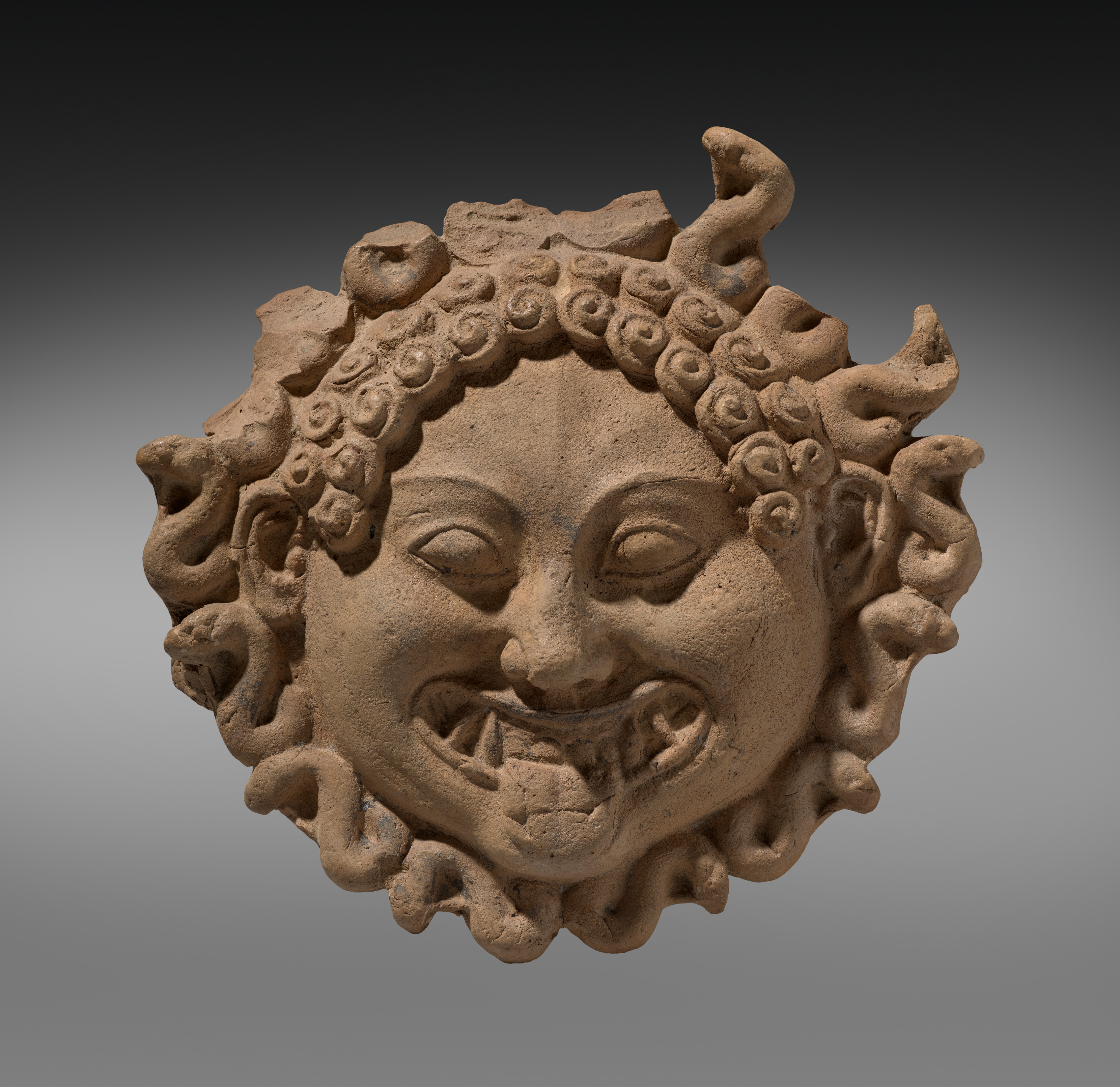 Gorgoneion Antefix (Ornamental Roof Tile) | Cleveland Museum of Art