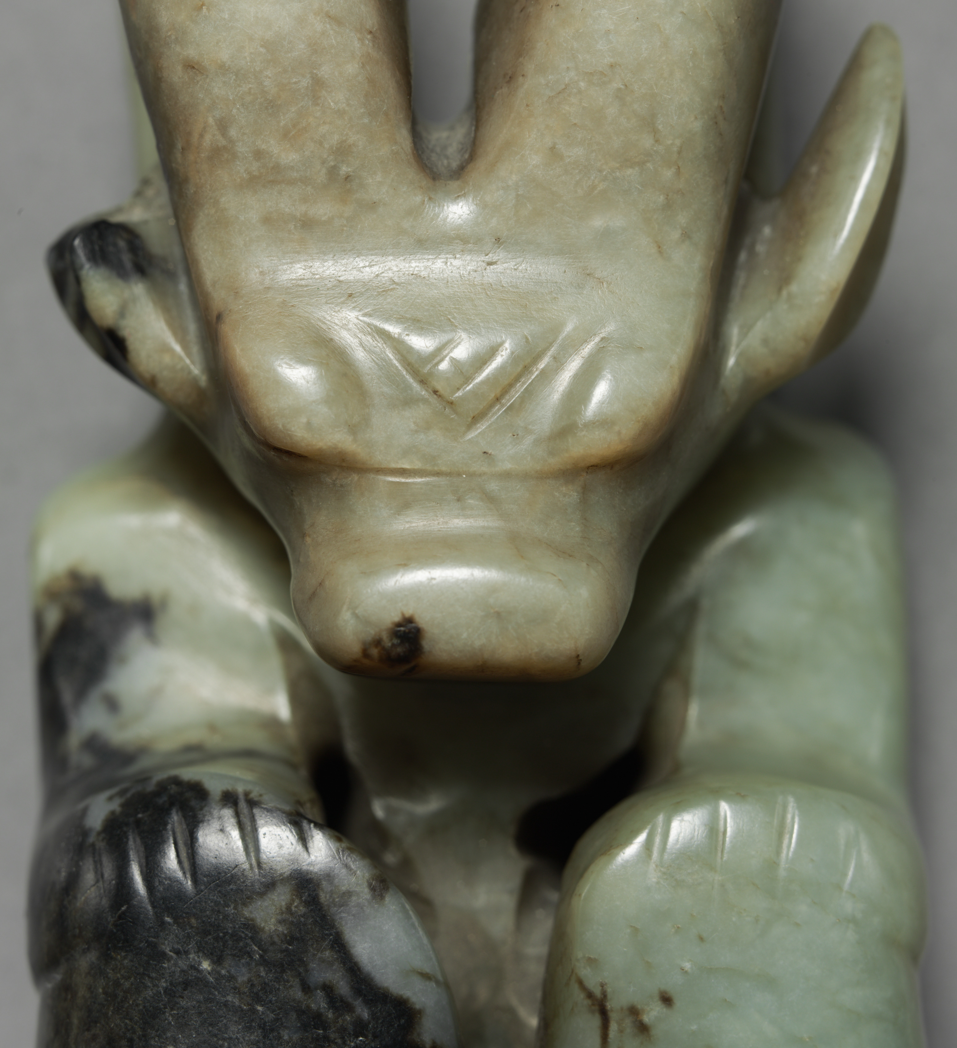Amulet in the Form of a Seated Figure with Bovine Head Amulet in the Form of a Seated Figure with Bovine Head